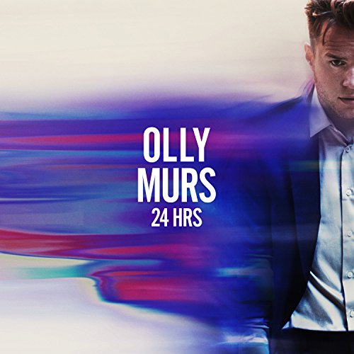 "Album cover with Olly Murs in a blue suit against a blurred blue background."