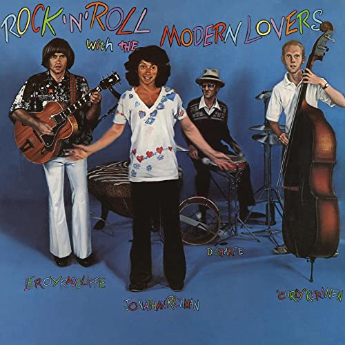 Album cover featuring four musicians with guitars and a double bass.