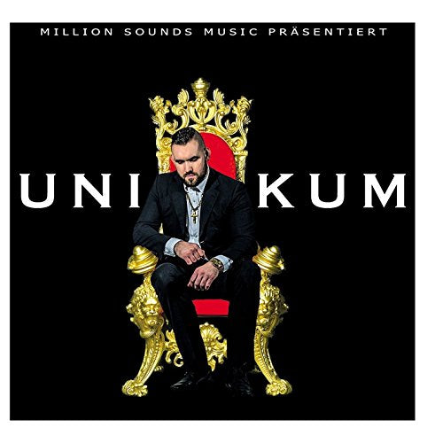 CD cover: man in suit seated on ornate gold throne.