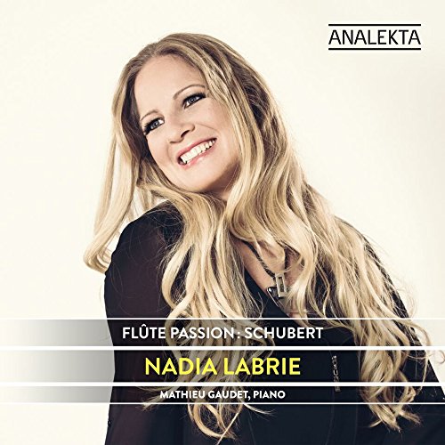 CD cover featuring a smiling woman with long blonde hair, wearing a black top.