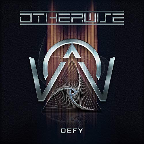 CD cover for “Otherwise - Defy” featuring a metallic logo and design.
