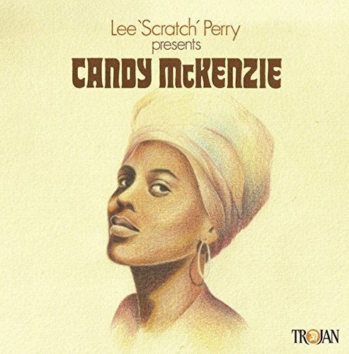 Album cover featuring a woman's portrait, wearing a head wrap, on a beige background.