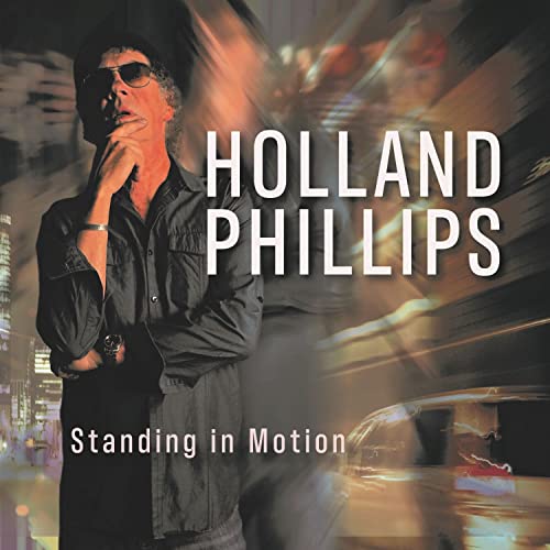 CD cover for Holland Phillips’ “Standing In Motion” featuring a man in a suit.