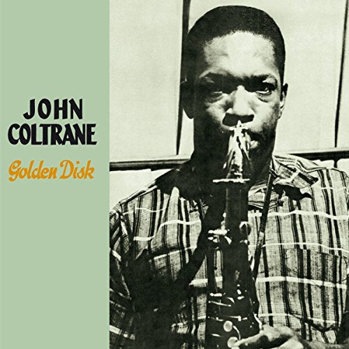 John Coltrane album cover with a black and white photo of him playing saxophone.