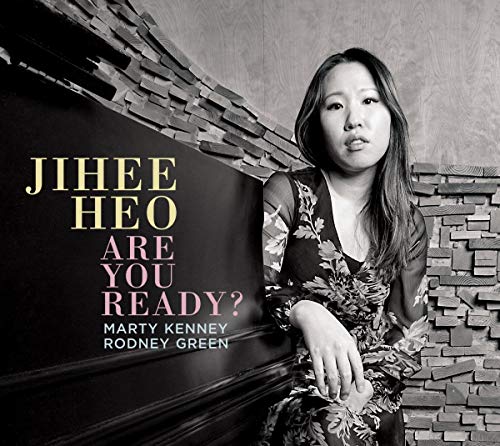 Jihee Heo album cover featuring a portrait of the artist.