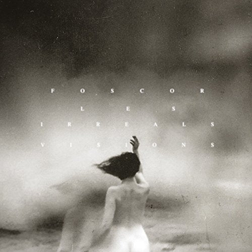 Black and white vinyl album cover with a woman in a flowing white dress.