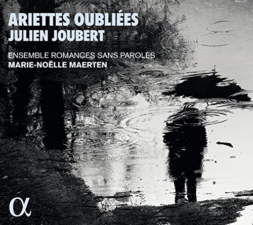 CD cover with a silhouetted figure holding an umbrella in rain.