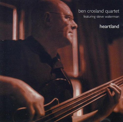 "Album cover with a man playing double bass, titled 'Ben Crosland Quartet - Heartland'."