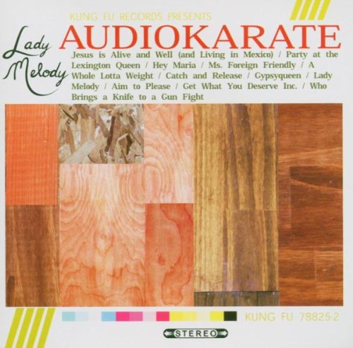CD cover for Audio Karate-lady Melody, featuring wood panel collage.