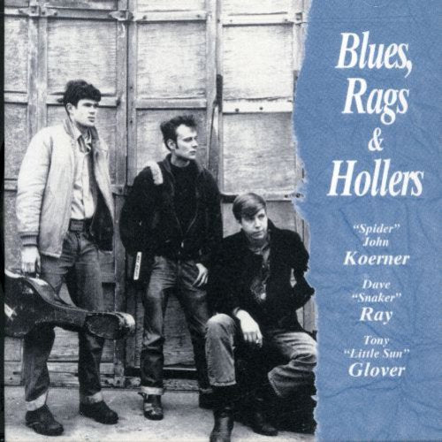 "CD cover with three men and torn blue background with white text."