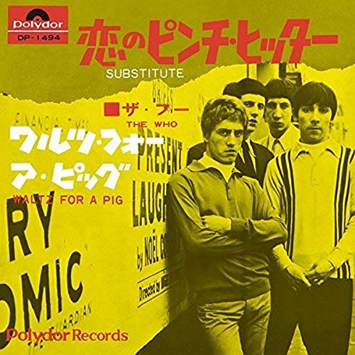 Yellow album cover featuring The Who band members in a street scene.