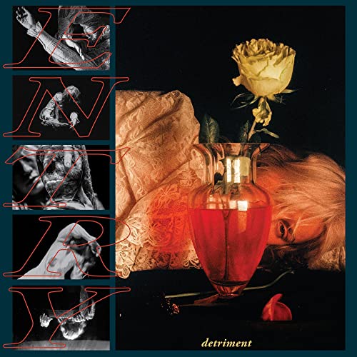Album cover featuring a woman beside a red-filled vase and rose with side text.