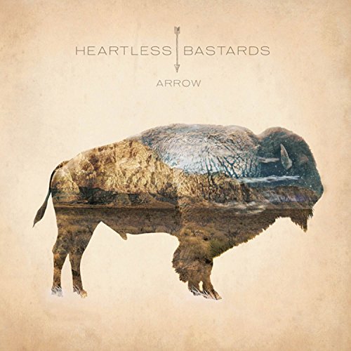 Album cover featuring a buffalo silhouette filled with a mountain landscape on beige background.