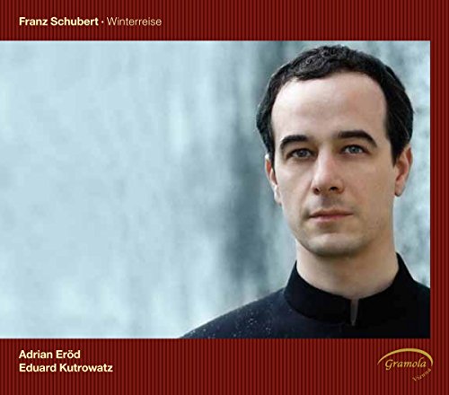 CD cover: portrait of a man with dark hair, red striped background.