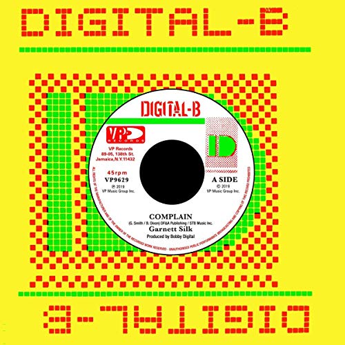 Vinyl record label for Garnett Silk’s “Complain” with pixelated background.