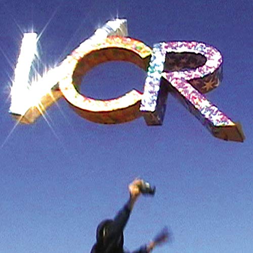 Large, illuminated "ICR" letters against a blue sky, viewed from below.