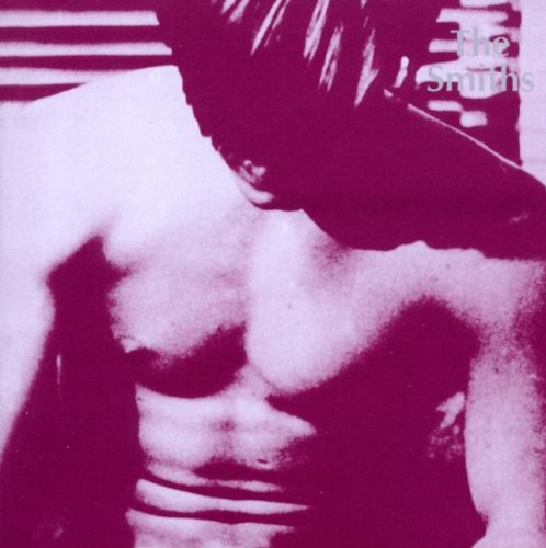 A monochrome album cover featuring a shirtless man with the text "The Smiths".