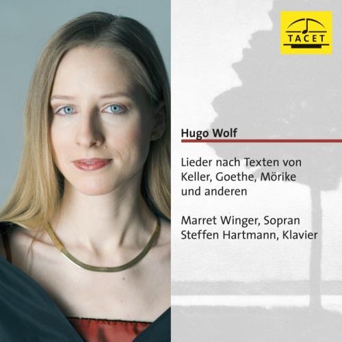 CD cover with a woman's portrait and text on a grey background.