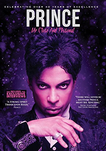 Prince DVD cover featuring a close-up of Prince's face and hand, purple background.