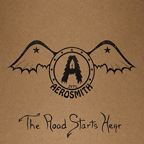 Aerosmith album cover: winged “A” logo on a tan background.
