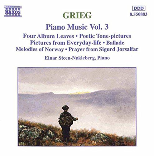 "CD cover featuring a man standing on a rocky hill with a walking stick."