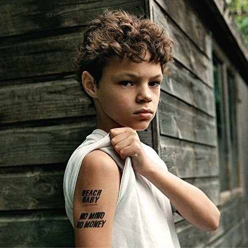 CD cover featuring a young person with curly hair against wood siding.