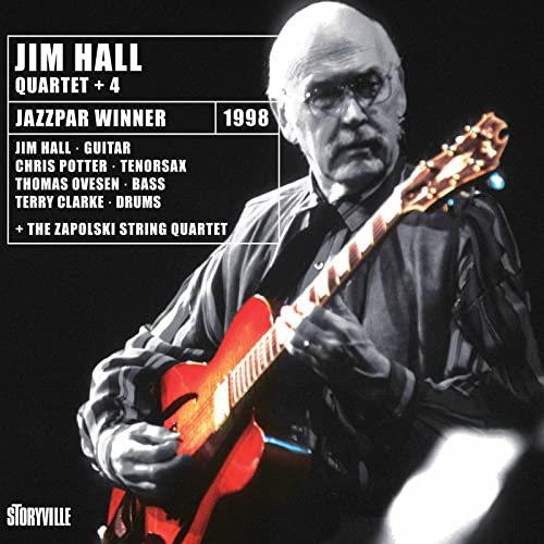 Jim Hall album cover: guitarist with red guitar, black background.