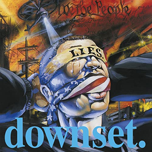 CD cover art: distressed face with American flag covering mouth, text "downset.