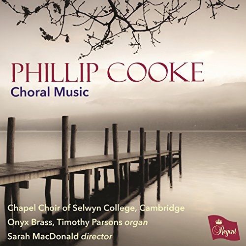 "CD cover featuring a serene lake scene with a wooden dock and misty mountains."