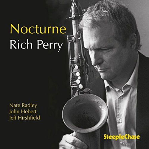 "Album cover featuring a man holding a saxophone, with text on a black background."