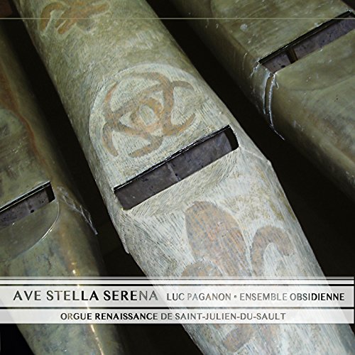 CloseHorns of an antique organ with painted decorative symbols and text at the bottom.