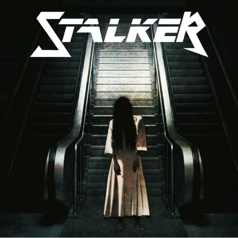 CD cover: dark staircase with a silhouetted figure facing away.