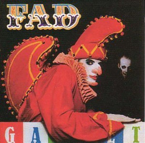 Album cover featuring a person in an orange jester's costume with a skull in the background.