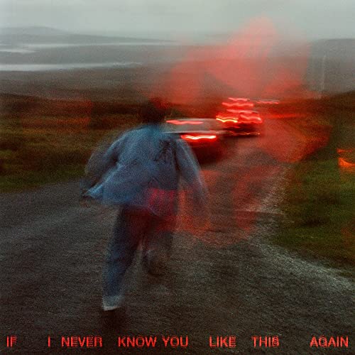 CD cover: blurry image of a person and taillights in a red haze.