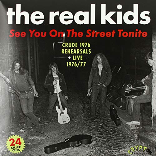 Vinyl record cover featuring a black and white photo of a band.