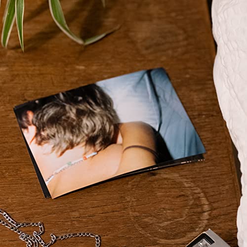 Vinyl record cover for Thomas Headon’s “Victoria,” showing a person’s back.