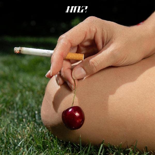 Album cover: hand holding a lit cigarette above a cherry.