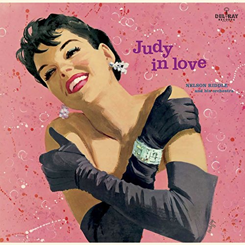 Judy Garland portrait on pink album cover, wearing gloves and jewelry.