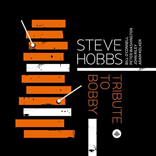 "Album cover with black background, orange and white xylophone keys, and text."
