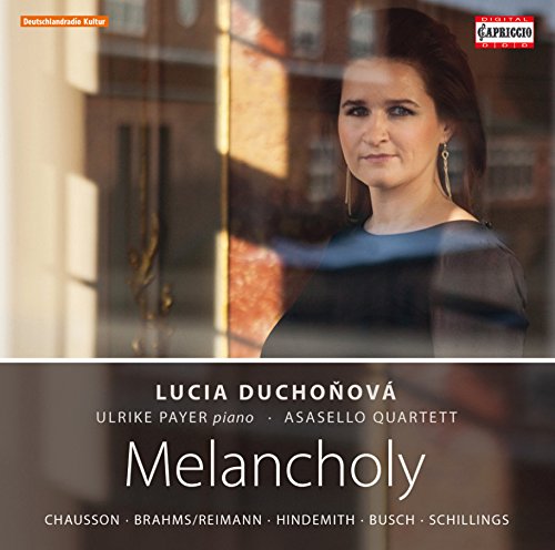 "CD cover with a woman's portrait and 'Melancholy' text."