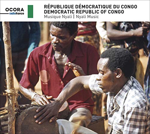 "CD cover featuring two men playing drums, with text banner at the top."
