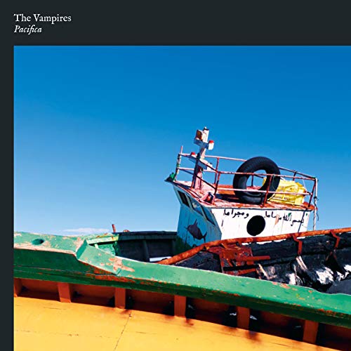 "Album cover featuring a damaged boat on a dock against a clear blue sky."