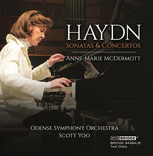 Woman playing piano on a CD cover with white text overlay.