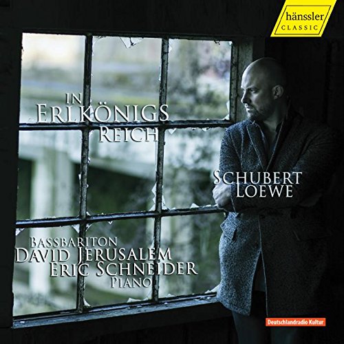 "CD cover featuring a man standing by a broken window, with text overlay."