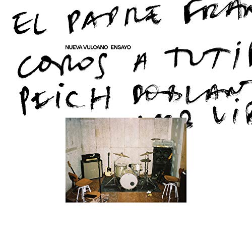 Vinyl album cover with handwritten text and a band in a room.