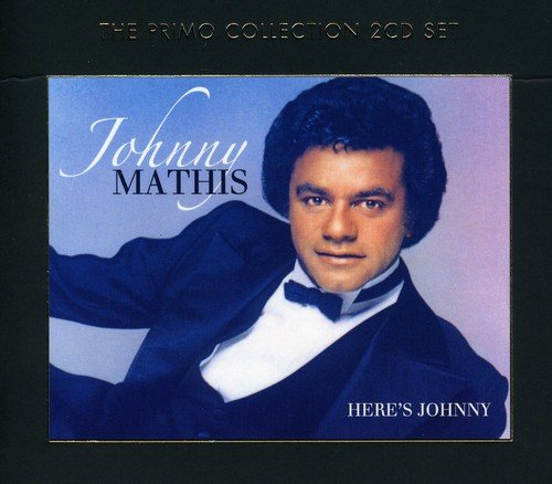 Johnny Mathis album cover with a man in a tuxedo on a black background.