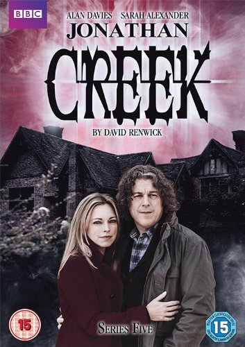 DVD cover featuring a man and woman in front of a house.