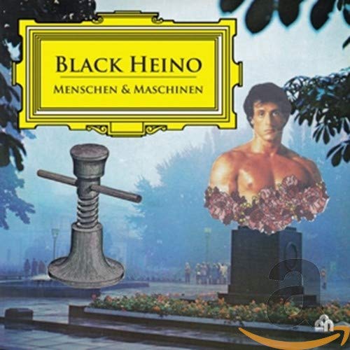 "Album cover with a man, statue, and hammer against a park background."