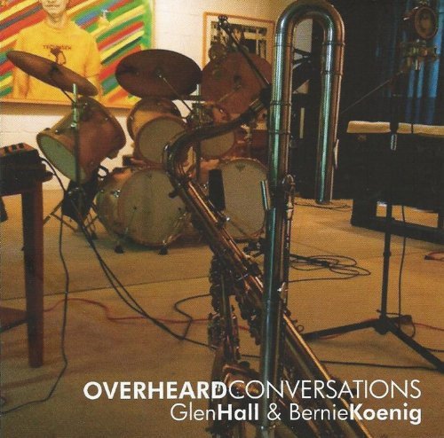 "Album cover featuring a drum set and tuba in a room with art."
