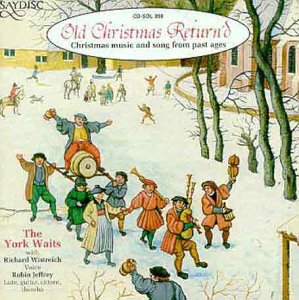 CD cover depicting a festive procession of musicians in a snowy landscape.